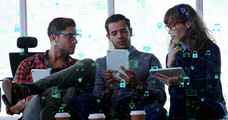 Poster - Image of network of digital icons against diverse group of colleagues discussing at office