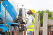 © JU.STOCKER - Foreman worker checking project at the precast factory site, Engineer man hardhats on construction site
