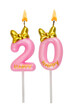 Pink birthday candles with bow isolated on white background. Number 20.
