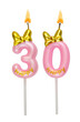 Pink birthday candles with bow isolated on white background. Number 30.