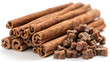 cinnamon sticks isolated on white,
A pile of cinnamon sticks and dog chews on a whi 