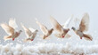 white doves in the sky,
 A group of pigeons flying in the sky on a white