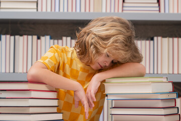 Aufkleber - Tired school boy, bored pupil at school. Child not study read book in classroom.
