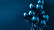 © Gita - A cluster of sleek blue balloons with a metallic sheen floats against a deep blue backdrop, creating a sophisticated and modern celebratory atmosphere