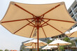 Sun loungers and umbrellas near the hotel