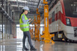 © SpaceOak - Engineer reviews data, updates train maintenance, and ensures safety for quality rail service.