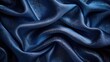 Luxurious navy velvet fabric with sparkling details, creating a deep textured look
