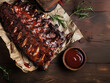 Barbecue ribs surrounded by Barbecue sauce