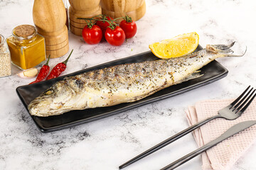 Poster - Grilled sea bass fish served lemon