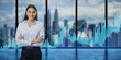 Happy young woman with folded arms standing in blurry office with panoramic windows and city view, creative growing candlestick forex chart on blurry background. Financial growth and stock concept.