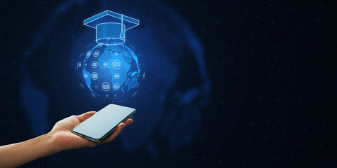 Poster - Close up of female hand holding smartphone with creative glowing online education hologram on dark blue polygonal background with mock up place. E-learning and course concept.