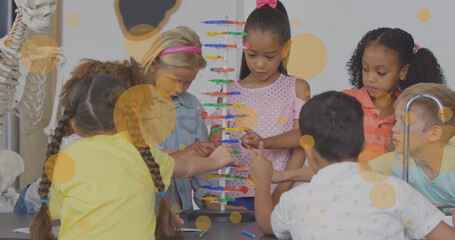 Poster - Image of yellow spots over diverse school children in classroom