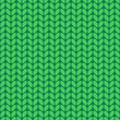 Vector Christmas knitted seamless pattern. Green knit texture. Knitted wool fabric texture for background, wrapping paper, textile design, decoration.
