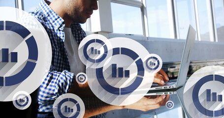 Poster - Image of graph icon in circles over latino man typing on keyboard of laptop in office