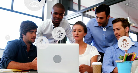 Poster - Image of profile icons in circles over diverse coworkers discussing reports on laptop at office