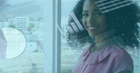 Poster - Image of data processing over african american businesswoman using laptop