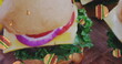 Image of hamburger icons over hamburgers on wooden surface