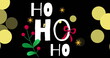 Image of ho ho ho text over stars and spots