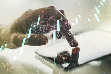 Poster - Double exposure of abstract creative financial chart with world map and with finger clicks on a digital tablet on background, research and strategy concept