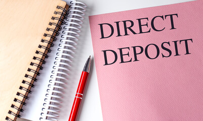 Poster - DIRECT DEPOSIT text on pink paper with notebooks