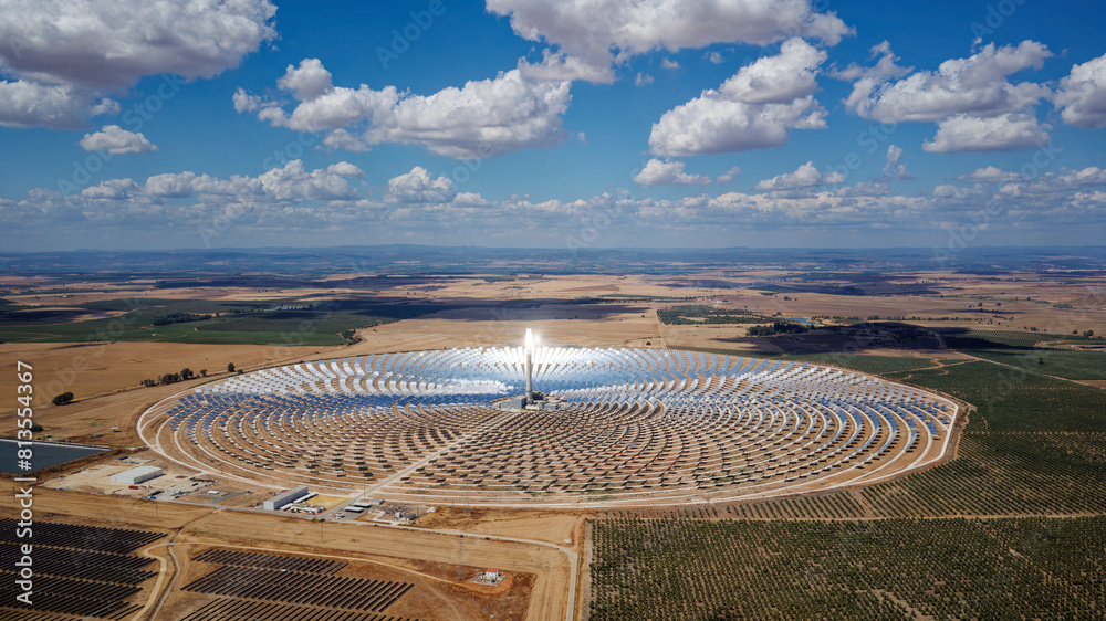 Aerial drone view of Gemasolar Thermosolar Plant in Seville, Spain. Solar energy. Green energy. Alternatives to fossil fuel. Environmentally friendly. Concentrated solar power plant. Renewable energy.