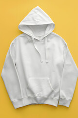 Wall Mural - White hoodie mockup isolated on yellow background