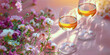 A pair of wine glasses filled with golden wine amidst a colorful array of garden flowers in soft lighting.
