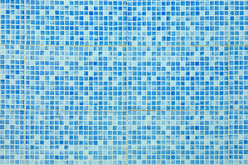 Wall Mural - pattern of small blue and white tiles in harmonic structure like a swimming pool ground