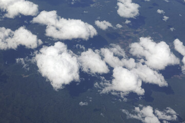 Wall Mural - View from an airplane window to see the sky and white cloud