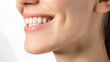 © Oksana - Close-up of smiling woman teeth side shot isolated on white background. Dental advertising