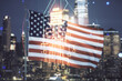 Double exposure of virtual creative light bulb hologram with chip on USA flag and blurry skyscrapers background, idea and brainstorming concept