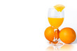 Orange juice in a glass on a white background