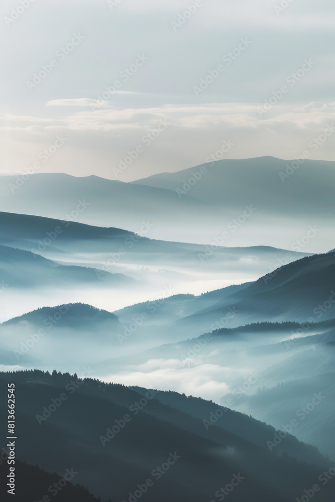 A tranquil view of the layers of mountain ridges disappearing into ...