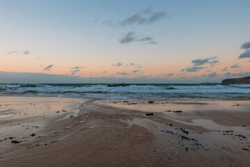 Wall Mural - Beautiful morning on an empty beach coastline.