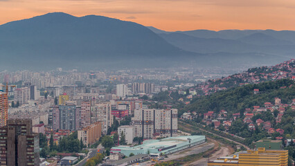 Wall Mural - Aerial view of the southern part of Sarajevo city timelapse.