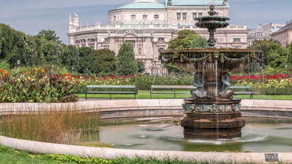 Wall Mural - Volksgarten timelapse, or People Garden public green park with roses in Vienna of Austria.