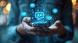 © sirisakboakaew - A close-up of the hands of a man holding a smartphone with Live Chat online communication and customer service technology, also referred