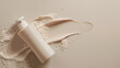 Skin moisturizing. The smear is creamy. Mockup of a beige cream dispenser on a nude background with a smear of cream. Cosmetic cream, hair mask, facial clay, top view, with empty space for text