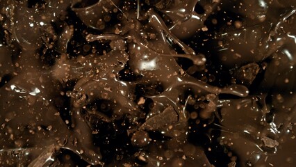 Poster - Freeze motion of flying group of raw chocolate pieces.