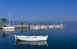 White boats and blue sea in the harbor Nafplio Greece summer season