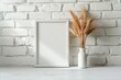 Minimalistic Mockup Frame on White Brick Background. Wheat in a Vase Decoration. Empty Frame Mockup.