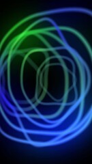 Wall Mural - Vertical Abstract Glowing Blue Green Lines 4K Loop features blue and green glowing gradient lines flowing toward the viewer against a black background in a vertical ratio loop, not a.i.