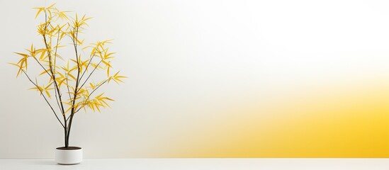 Poster - a yellow bamboo tree stands alone on a white background leaving ample room for a copy space image
