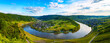 Panorama of the 180 degree river loop of the Moselle between Kröv and Traben-Trabach located in a popular wine-growing region in Germany. Wide angle perspective in the light of the evening sun in May.