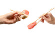 Sushi with tuna in a woman hand isolated on white background.