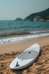 Serene Beachside Paddleboard Awaiting Adventure at Seashore