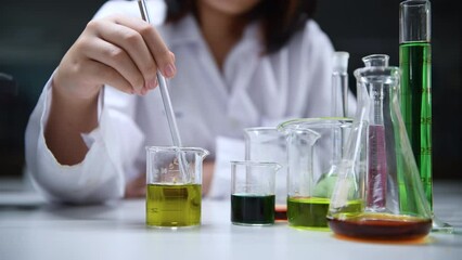 Wall Mural - little scientists manned chemicals in beakers.