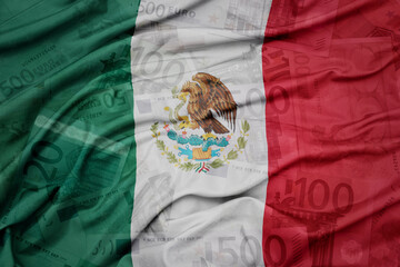 Wall Mural - waving colorful national flag of mexico on a euro money banknotes background. finance concept.