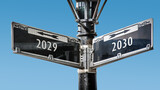 Fototapeta Mapy - Signposts the direct way to 2029 versus 2030