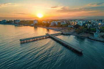 Poster - Aerial view of a pier in the middle of a body of water. Suitable for travel and vacation concepts